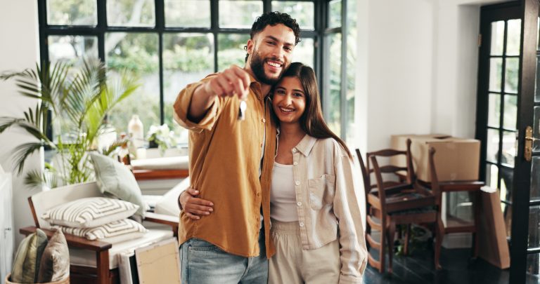 property-portrait-couple-with-keys-new-home-mortgage-investment-moving-relocation-homeowner-happy-people-pride-dream-house-achievement-real-estate-success-with-support