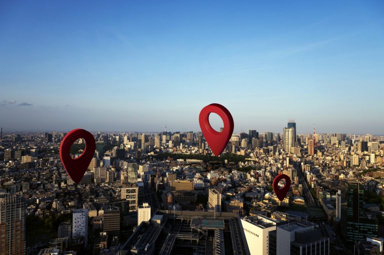 simbolo-de-localizacao-com-fundo-de-paisagem-scaled